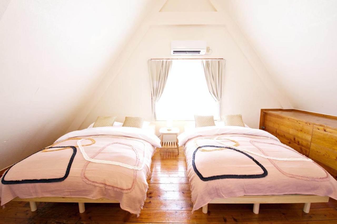 Ferienwohnung にらい恩納　あじさい Onna Exterior foto